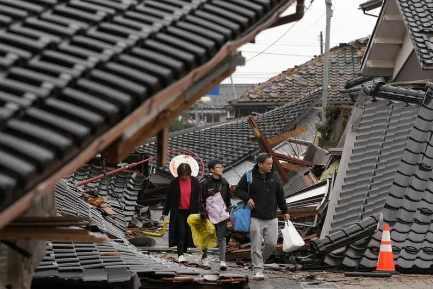 Japan earthquake: Woman in 90s found alive under rubble five days later