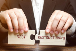 Insolvent firms to operate under debt restructure scheme